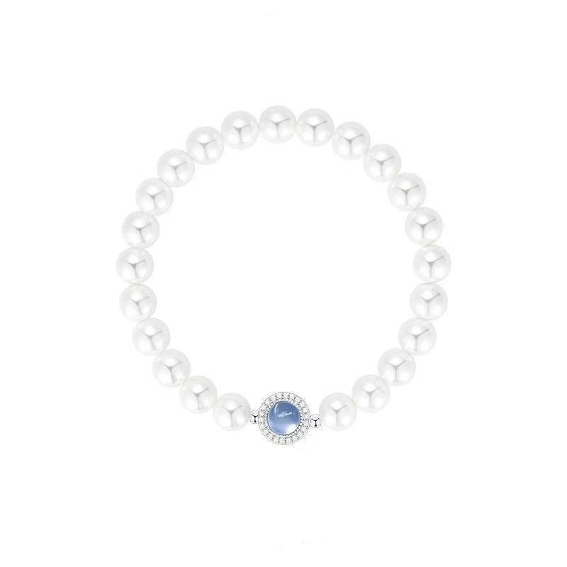 PEARL GLOW- SIMULATED PEARL BRACELET WITH BLUE CAT`S STONE