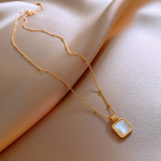 14K gold plated Fine chain with small steel beads and square mother of pearl pendant 